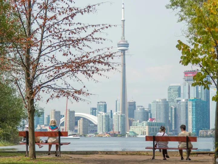 Image of the CN Tower from the Toronto Islands, one of the many spectacles of Canada your parent(s) could see as (a) permanent resident(s) of Canada.